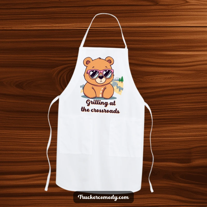 Funny Bear Apron: A bear wearing oversized sunglasses faces a winding road, a humorous and practical kitchen accessory.